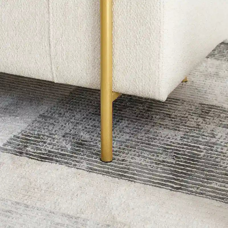 Banc de rangement rembourré en lin avec accoudoirs cylindriques et pieds en métal doré