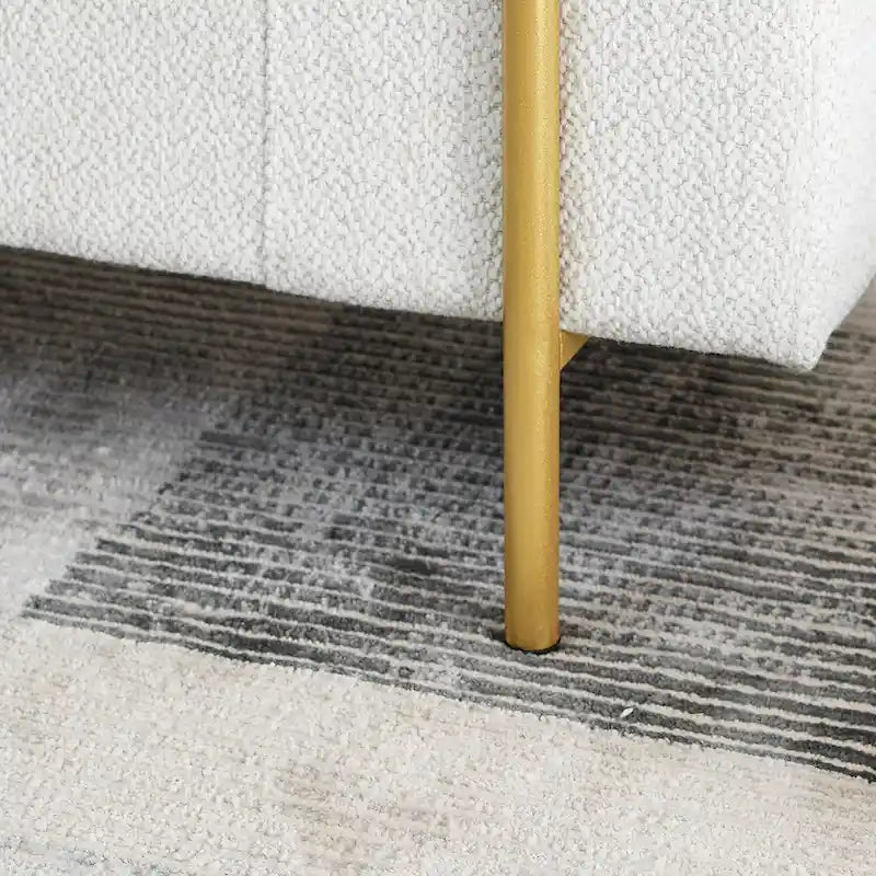 Banc de rangement rembourré en lin avec accoudoirs cylindriques et pieds en métal doré