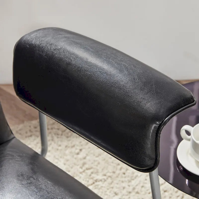 Fauteuil d'appoint en similicuir avec accoudoirs rembourrés